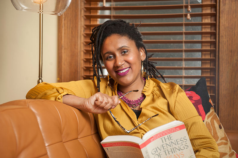 A woman smiling.