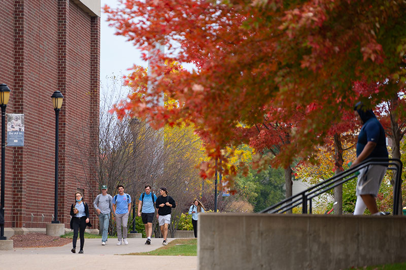Students walking on campus. Links to Closely Held Business Stock Students walking on campus. Links to Closely Held Business Stock