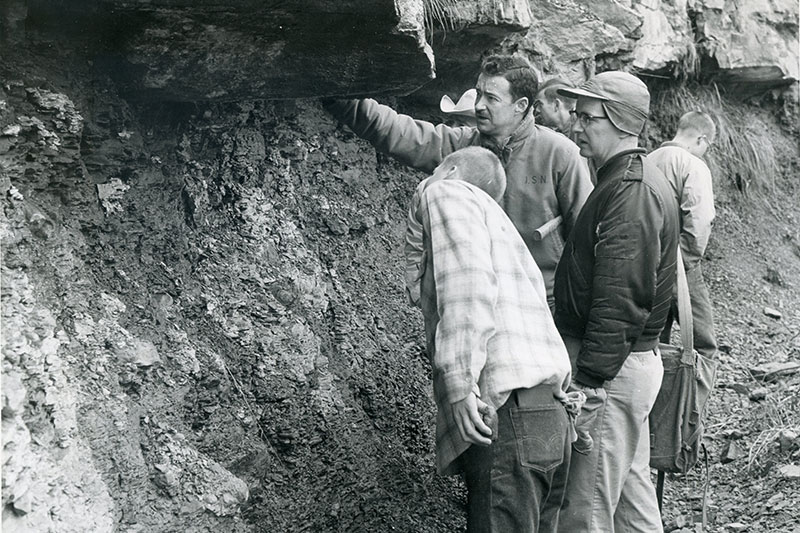 People in class outside. Links to Richard C. Stenstrom ’58 story