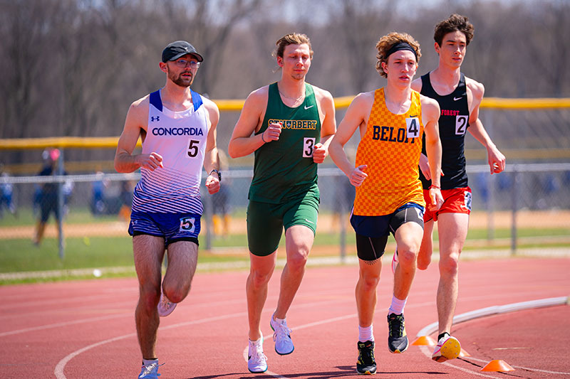 Student track athletes running. Links to Gifts That Pay You Income